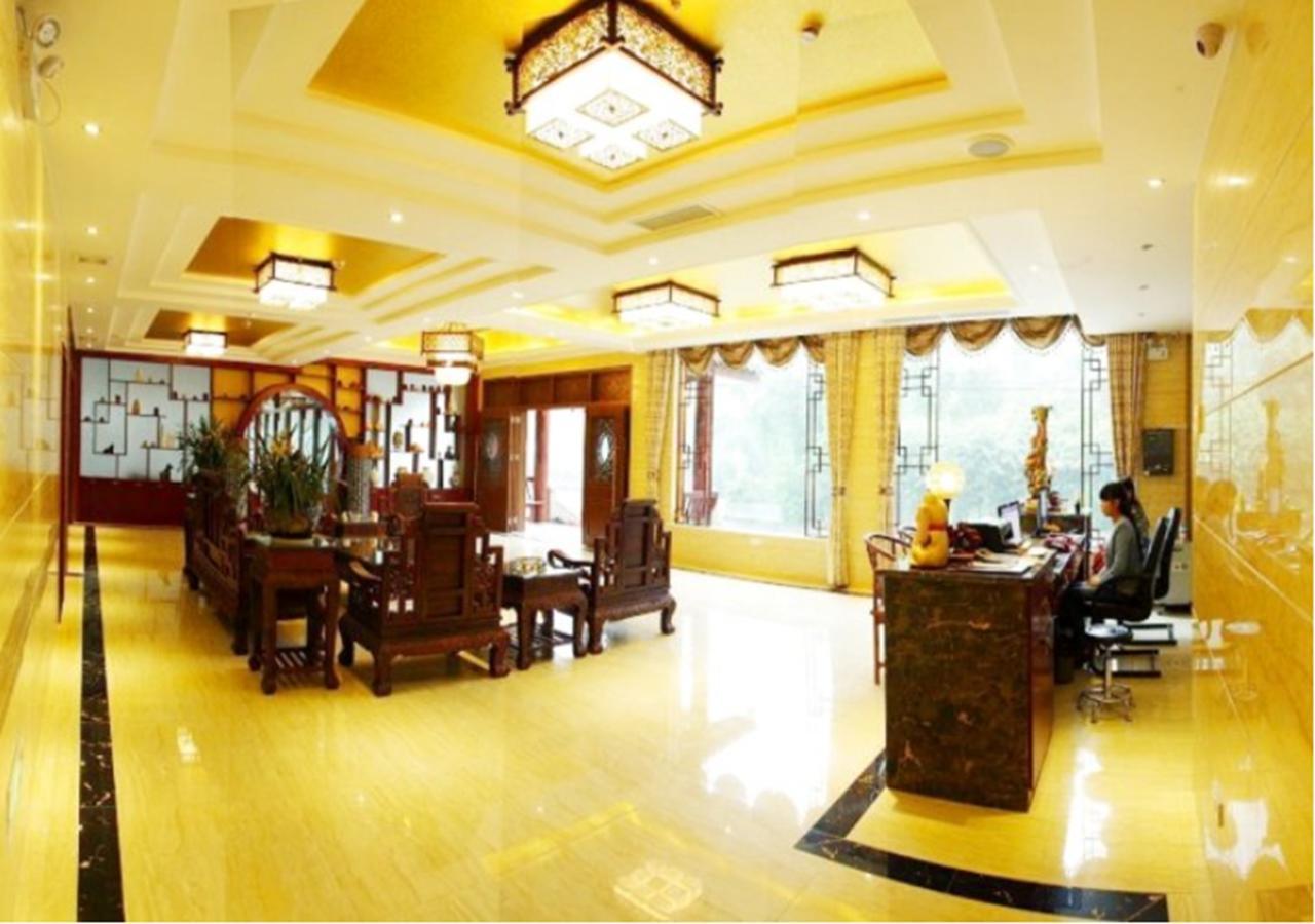 Xingzhou Hotel Лэшань Экстерьер фото